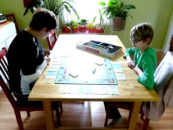 Homeschoolers playing Monopoly