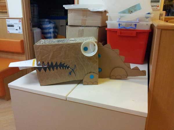 MAKEDO dinosaur out of recycled boxes