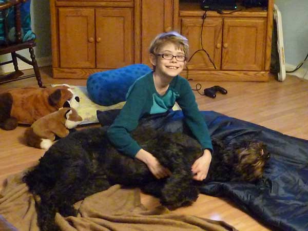 Ashar and our goldendoodle, Coby