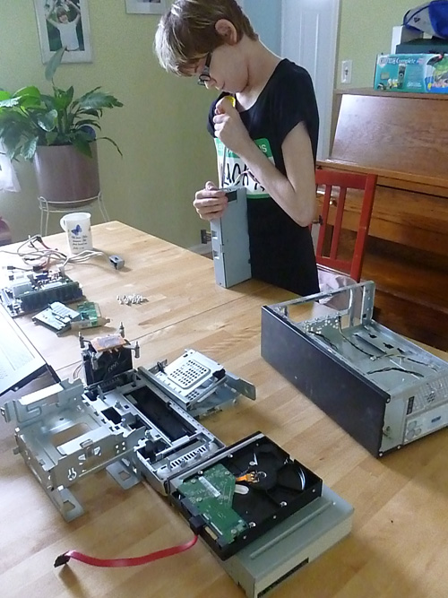 Taking apart an old computer as a homeschooling project