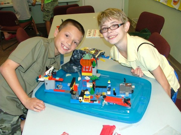 Bricks 4 Kidz participants build a fort