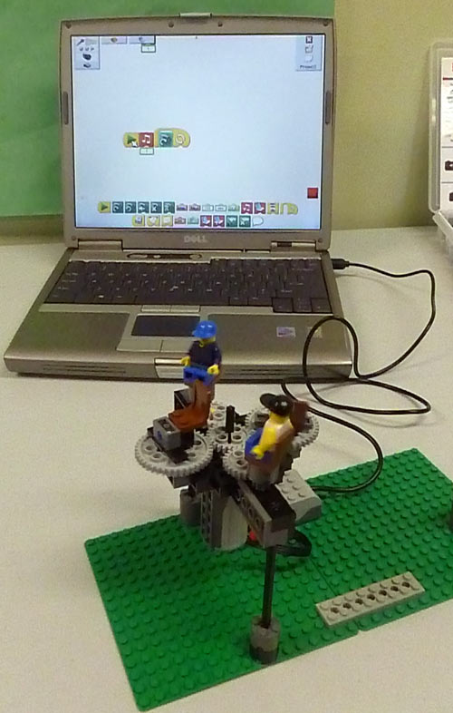 Lego minifigures ready to ride a robotic ride
