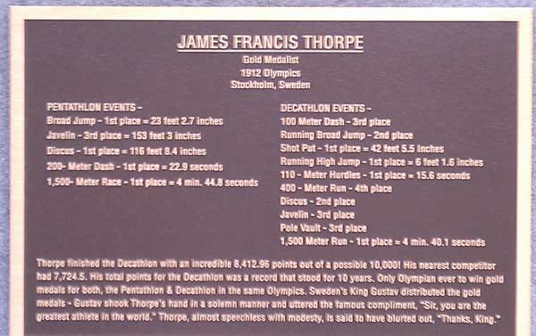 Plaque honoring Native American athlete Jim Thorpe on his tomb