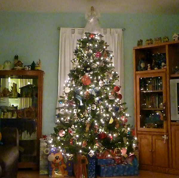 Family Christmas tree with gifts