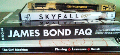 Collection of James Bond books and movies