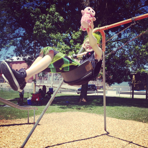 As part of a program our library does each summer, there's a challenge to hike and find waystations in 30 local parks. We did a few, accompanied by our trusty pink owl Fwoops, including this one where we found a cool swingset.