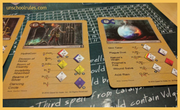 In Quest for Arete, the spell names are just as fun as the beautifully illustrated game cards. Wound Salve is H2O2 - which you might know as hydrogen peroxide - for example!