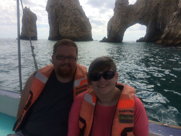 Unschooling on Unschool Rules: Dan and I were treated to an amazing cruise with his family as his 30th birthday present from his parents. Here we are on a glass-bottom boat tour in Cabo San Lucas, Mexico, enjoying 80-degree weather in February.