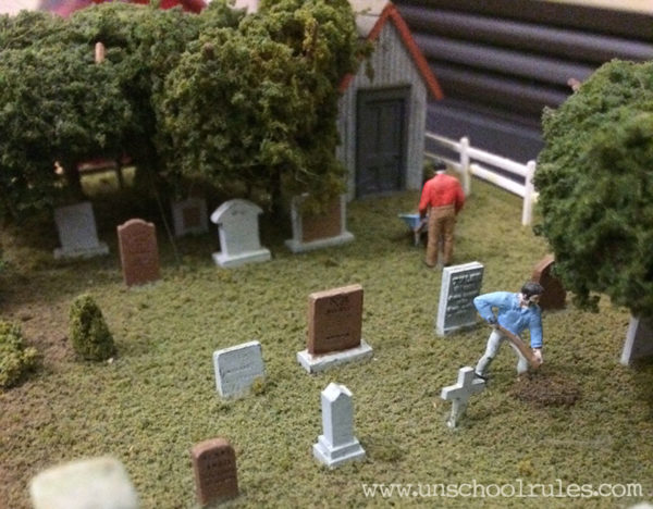 Unschool Rules: Buying a cemetery... to accompany a model train layout.